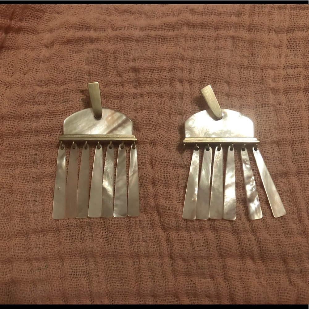 Kendra Scott earrings.